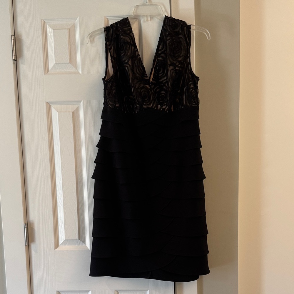 Chic Black Sleeveless Midi Dress with Lace Detail